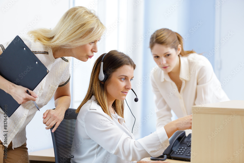 young secretary in office during training young secretary in office during training