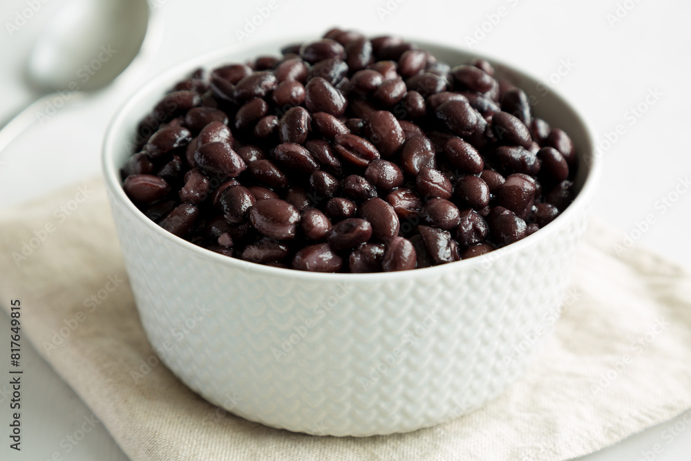 Homemade Preserved Black Beans in a Bowl, side view. Homemade Preserved Black Beans in a Bowl, side view.