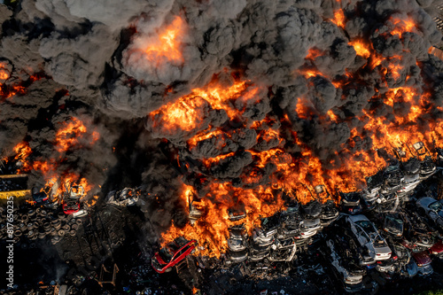 A massive fire burns through a junkyard in Philadelphia, as seen photo