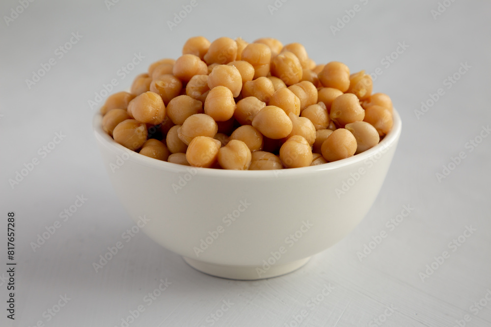 Homemade Preserved Chickpeas in a Bowl, side view. Close-up. Homemade Preserved Chickpeas in a Bowl, side view. Close-up.
