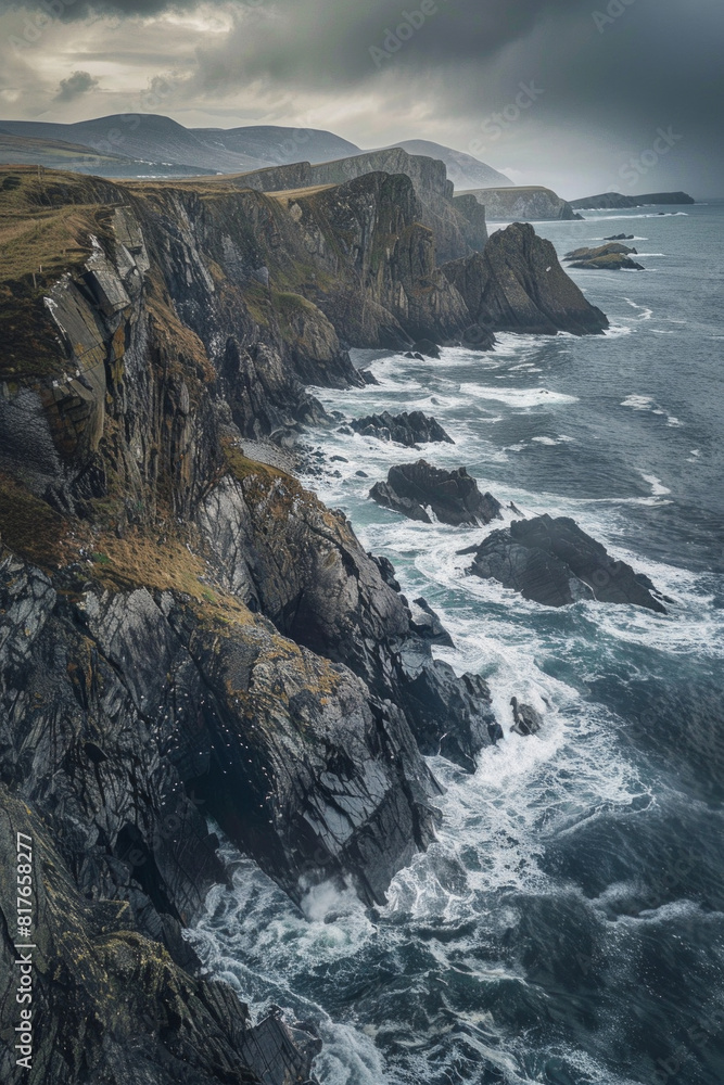 An aerial view of a rocky coastline, with waves crashing against the rugged cliffs, showcasing the contrast between smooth and rough textures. 