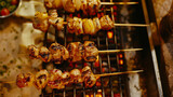 Juicy Chicken and Vegetable Skewers Grilling Over Flames