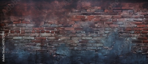 Copy space image of a grungy background with a dark brick wall texture
