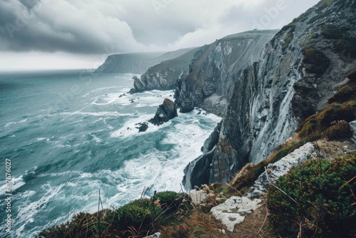 Dramatic Cliffs Overlooking Stormy Sea photo