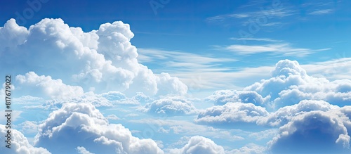 Skyward view of fluffy clouds adorning the picturesque copy space image