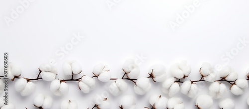 Copy space image of white cotton background with buttons