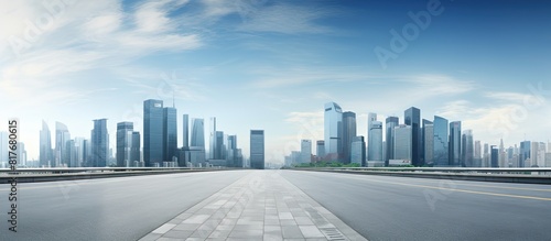 Empty road surrounded by a panoramic skyline of buildings with plenty of copy space for images 118 characters