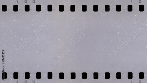 Old celluloid film strip with dust and scratches