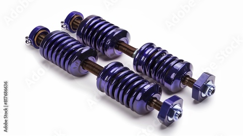 Glossy indigo shock absorbers isolated on a white backdrop - car suspension and ride quality components photo