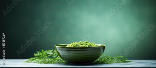 A bowl with dill weed creating a calming and aromatic ambiance with copy space image