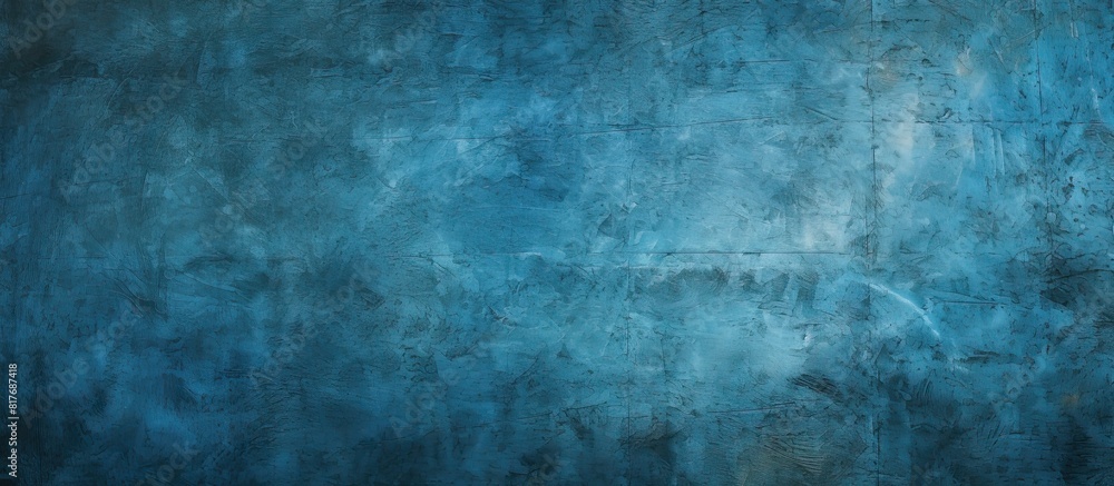 A grungy blue background with a scratched and dotted texture providing ample copy space for images