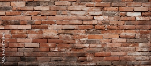 A simple design displaying the textured brick wall as a background leaving plenty of space for copy