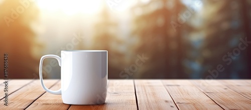 A mug is placed on a desk with copy space image