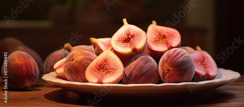 A plate of succulent fig peaches perfectly ripe and enticing Set against a food background leaving room for other elements in the image. Creative banner. Copyspace image photo