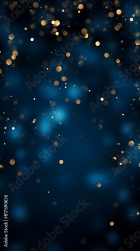 Golden glitter particles on dark background