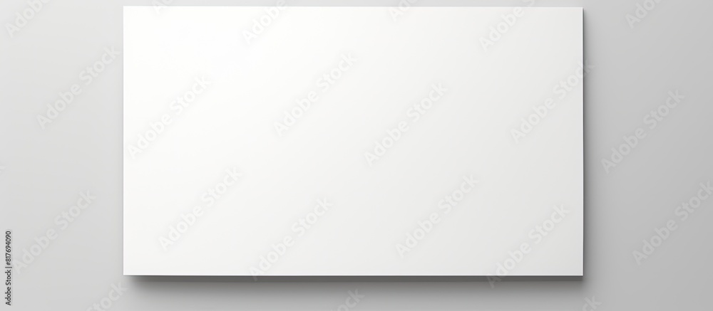 Obraz premium A white document displayed on a plain white surface providing ample empty space for images or text
