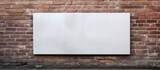A blank metal sign is mounted on a brick wall leaving empty space for an image or text. Creative banner. Copyspace image