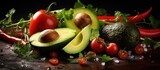 Ingredients for a delicious guacamole recipe ripe avocados fresh limes onion salt olive oil and a tomato A copy space image