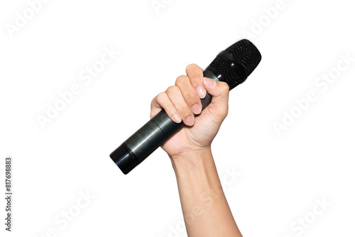 Close-up of a human hand holding a black wireless microphone on white background. Concept of public speaking, performance, singing, podcasting, or broadcasting. High-resolution studio shot.