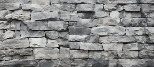 Copy space image with a gray granite stone wall as the background