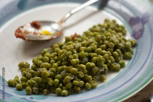 stewed peas with a spoon