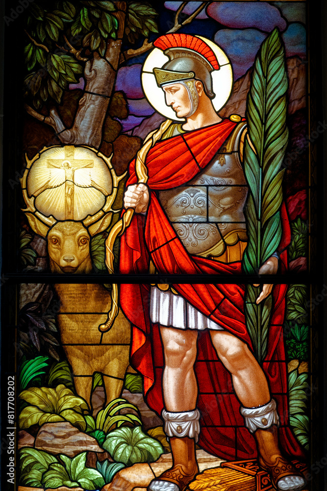 Stained glass window of Saint Hubert and the Deer. Vitrail de Saint Hubert et le cerf. Italie Stained glass window of Saint Hubert and the Deer. Vitrail de Saint Hubert et le cerf. Italie