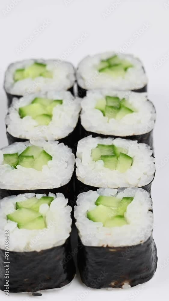 Set of kappa maki rolls spin on white background. Vertical video. Set of kappa maki rolls spin on white background. Vertical video.