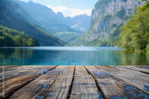 Empty wooden table top with blurred summer lakes mountain background exuberant