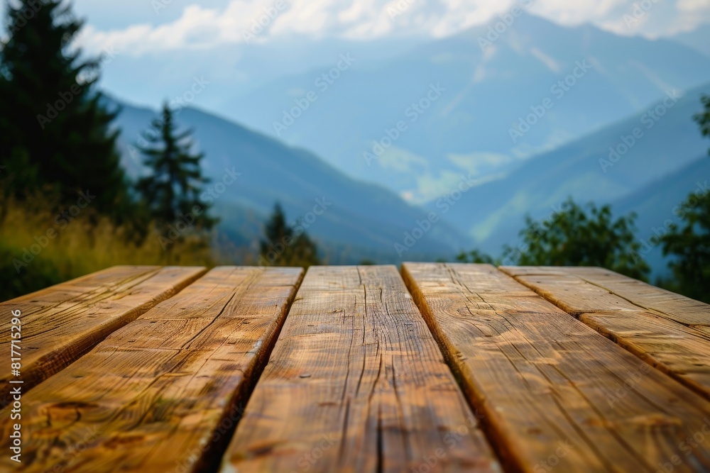 Focused on wooden table in mountain setting Focused on wooden table in mountain setting