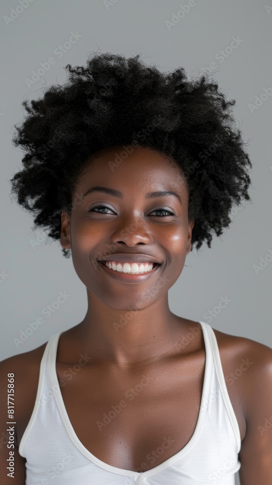 Happy black woman's face for dermatology, aesthetic shine, and skincare on white backdrop. Female model with natural beauty, afro hair in studio for shine, healthy grin makeup. Happy black woman's face for dermatology, aesthetic shine, and skincare on white backdrop. Female model with natural beauty, afro hair in studio for shine, healthy grin makeup.