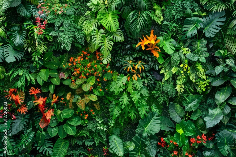 Vertical garden with tropical greenery and flowers nature backdrop Vertical garden with tropical greenery and flowers nature backdrop