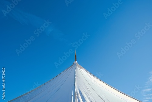 Viewing white tent with blue sky above