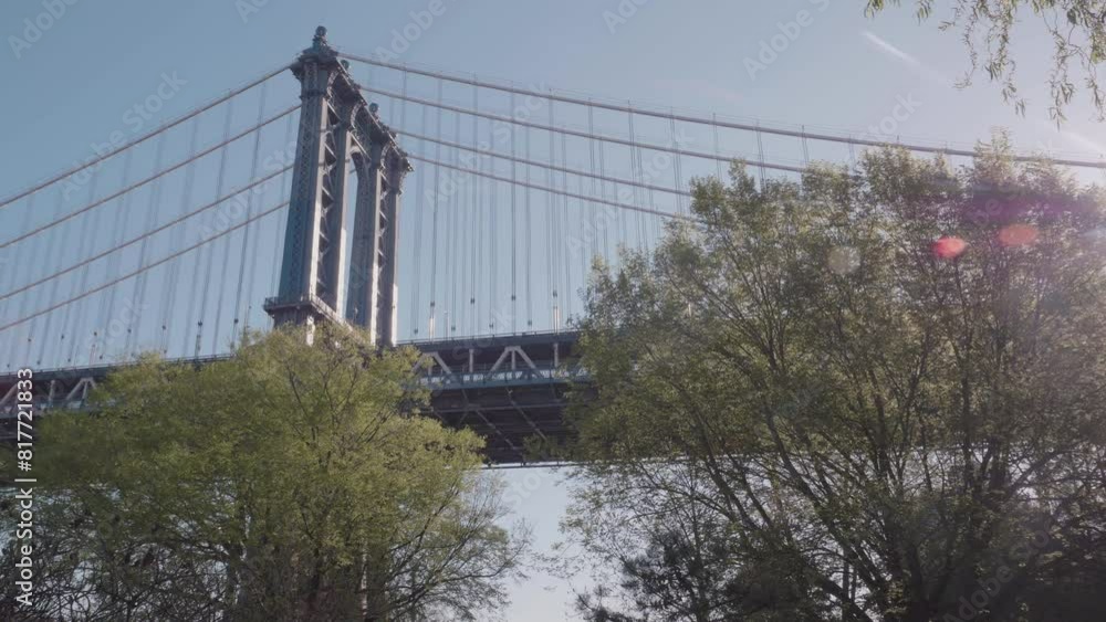 Handheld shot of The Manhattan Bridge on a spring morning Handheld shot of The Manhattan Bridge on a spring morning