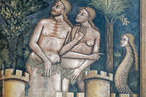 Fototapeta Fresco of Adam and Eve in paradise tempted by the snake