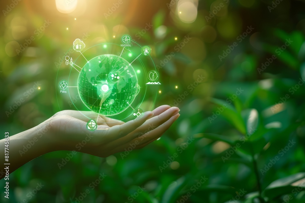 Hand holding a glowing green holographic sphere with ecofriendly icons, symbolizing sustainability and renewable energy, lush green background, futuristic and environmental theme Hand holding a glowing green holographic sphere with ecofriendly icons, symbolizing sustainability and renewable energy, lush green background, futuristic and environmental theme