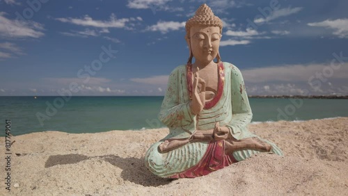 buddha statue on a beach photo