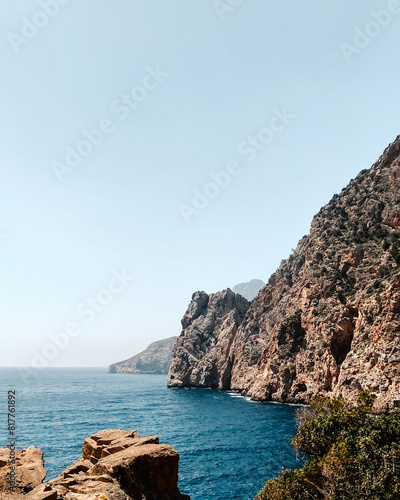 Scenic view of Ibiza beach with clear blue turquoise water seen from from Beach Atlantis, Spain