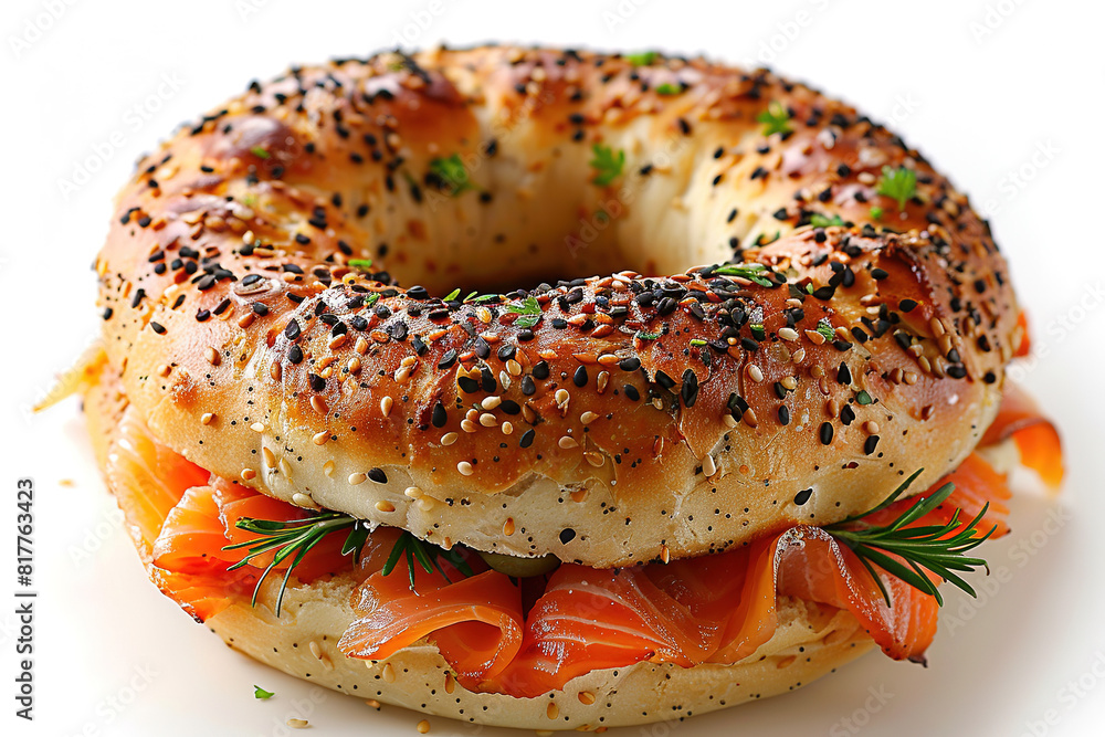 a delicious and mouth-watering smoked salmon bagel. On isolated white background a delicious and mouth-watering smoked salmon bagel. On isolated white background