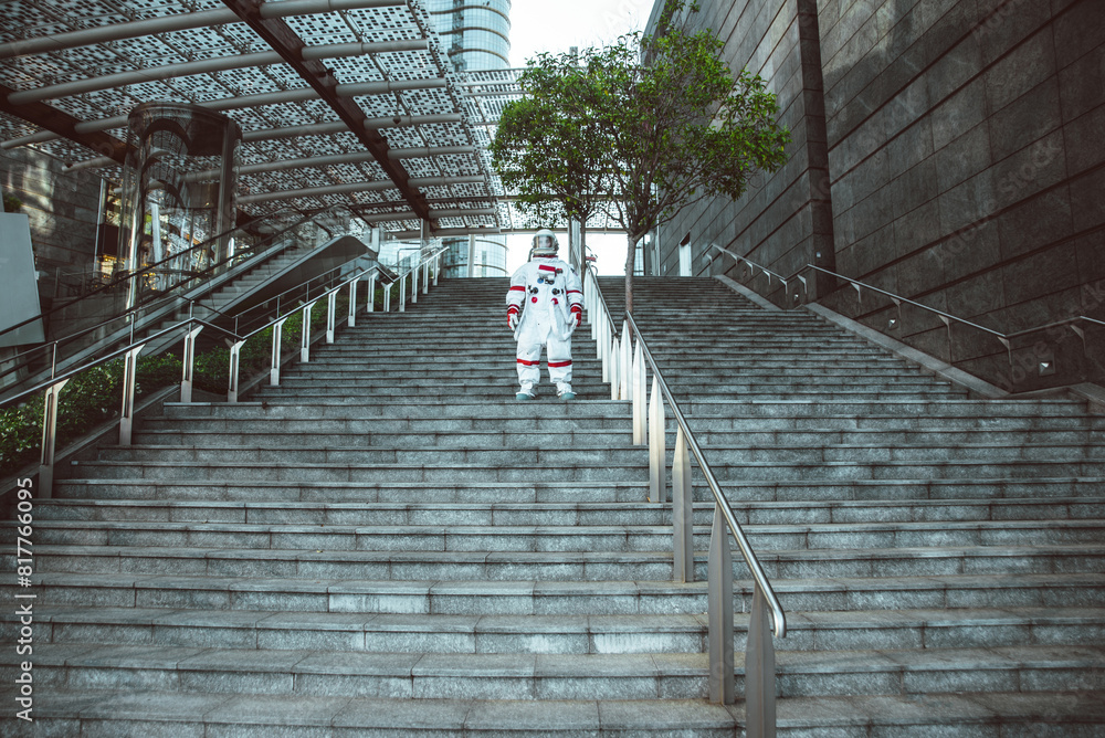 Cinematic fiction image of a modern astronaut roaming in a city on planet earth. concept about humanity living on other planets in the future. Cinematic fiction image of a modern astronaut roaming in a city on planet earth. concept about humanity living on other planets in the future.