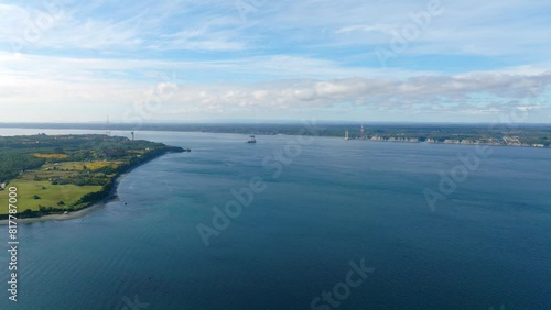 Aerial View Of Chacao channel With Construction Of Bridge Between Mainland And Big Island of Chiloe In background. photo
