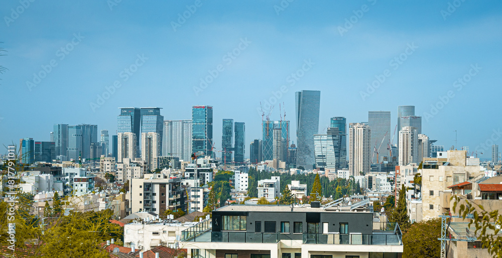 Fototapeta premium view of a city skyline with a jet plane flying above it
