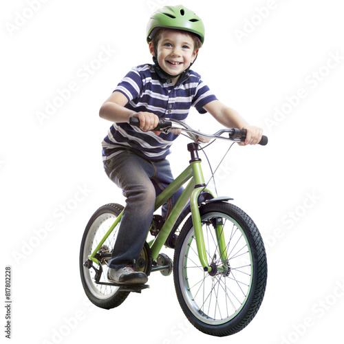 A young boy is riding a green bicycle with a helmet on © Mustafa