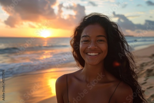 Young woman standing on top of a sandy beach  perfect for travel websites
