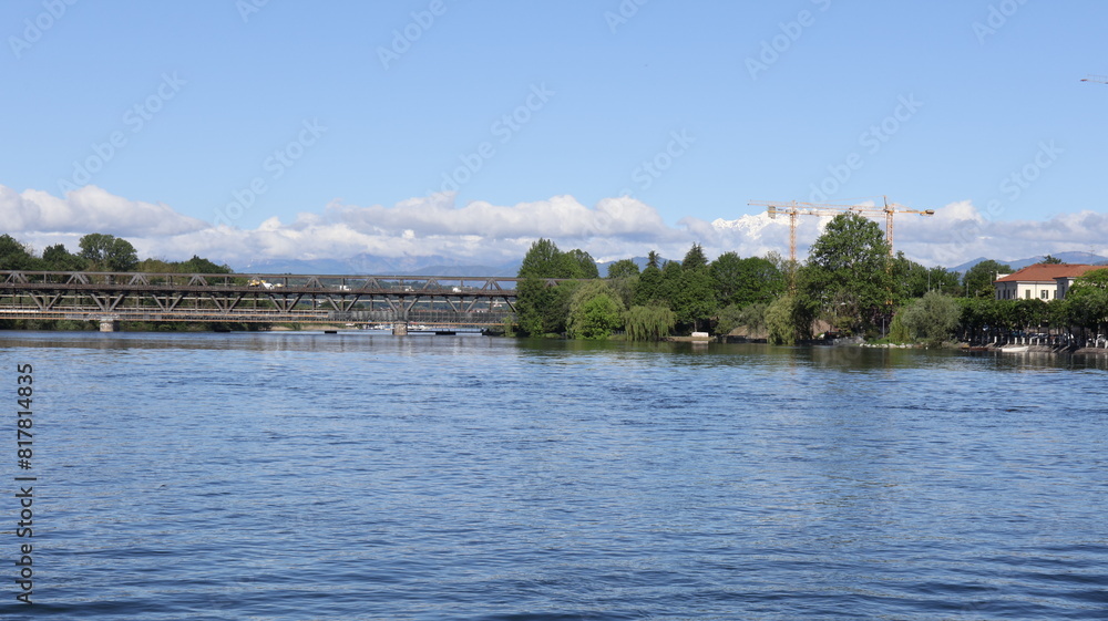 Fototapeta premium Bridge over lake Maggiore in a sunny day in sesto Calende in Lombardy, Italy.