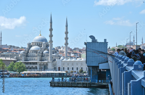 Fishermen on Galata bridge, Istanbul photo