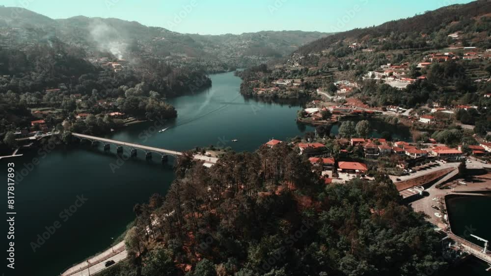 Aerial View of Village, Forest, Hills, mountains, Cavado River in Rio Caldo Portugal 4K Aerial View of Village, Forest, Hills, mountains, Cavado River in Rio Caldo Portugal 4K