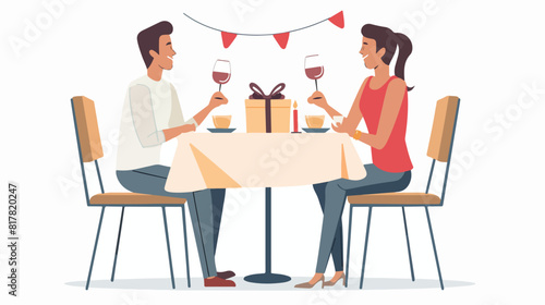 Couple sit at table in restaurant hold gift box vector
