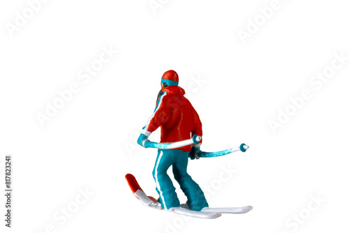 Miniature people , A skier full length Isolated with clipping path © Sirichai Puangsuwan