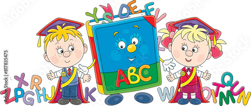 Happy little boy and girl graduates of kindergarten with red holiday ribbons and a funny cartoon character ABC book with colorful letters of English alphabet, vector illustration on white