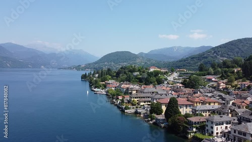 Drone footage of the lakefront buildings in Orta San Giulio town in Novara Province, Piedmont, Italy photo